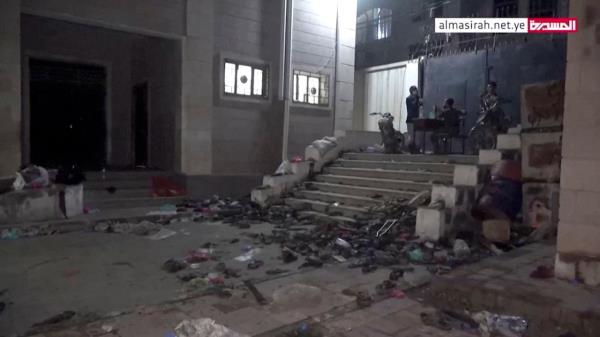 This screengrab shows abando<em></em>ned footwear and other belo<em></em>ngings lie on the ground after a stampede in Sanaa, Yemen, on April 19.