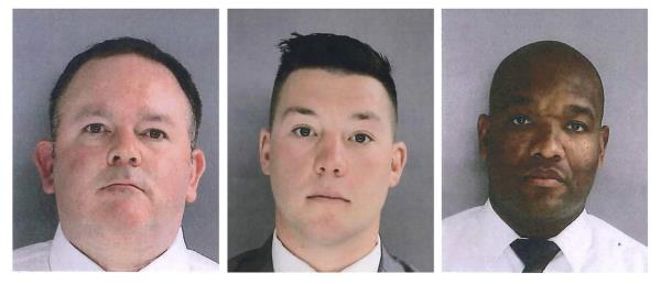 FILE - In this photo provided by the Delaware County District Attorney's Office on Tuesday, Jan. 18, 2022, Sharon Hill Police officers Brian Devaney, left, Sean Dolan and Devon Smith are shown. 