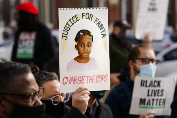 FILE - Protesters call for police accountability in the death of 8-year-old Fanta Bility who was shot outside a football game, at the Delaware County Courthouse in Media, Pa., on Jan. 13, 2022. 