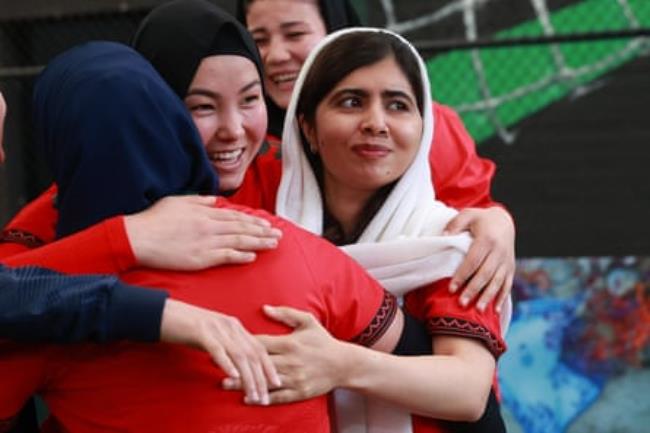 Malala Yousafzai with the Afghanistan team.