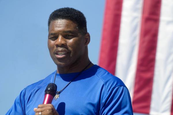 Georgia Republican Senate nominee Herschel Walker speaks during a campaign stop at Battle Lumber Company on Oct. 6, 2022, in Wadley, Ga.