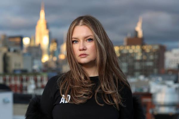 Anna Delvey poses for a photo at her home on Nov. 16, 2022 in New York.