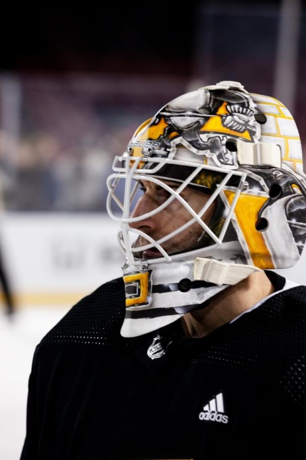 This photo shows a close-up shot of a hockey goalie.