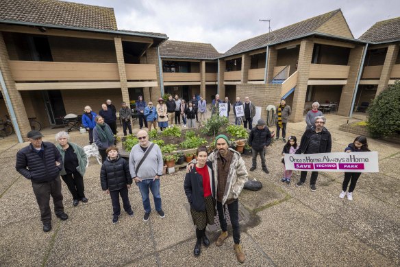 Techno Park Drive residents and their supporters in the courtyard of one of the housing blocks.