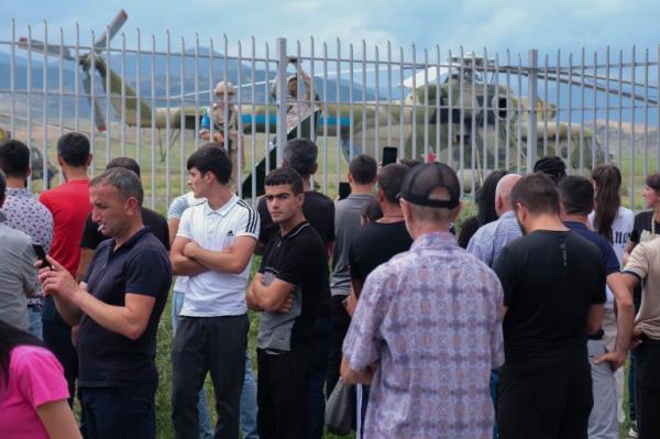 Demo<em></em>nstrators attend a rally to demand the reopening of a blockaded road l<em></em>inking the Nagorno-Karabakh region to Armenia in Stepanakert on July 14, 2023.