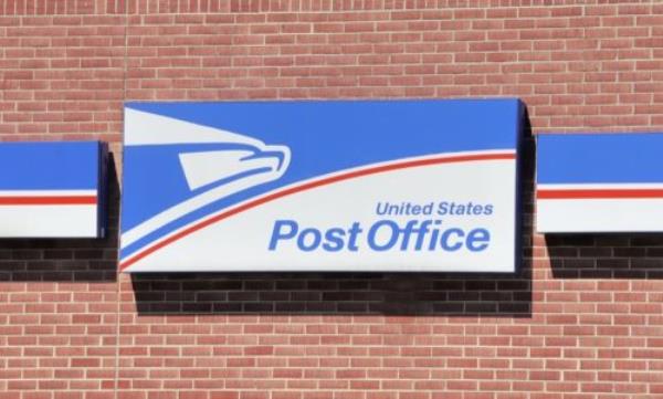 A sign for a post office