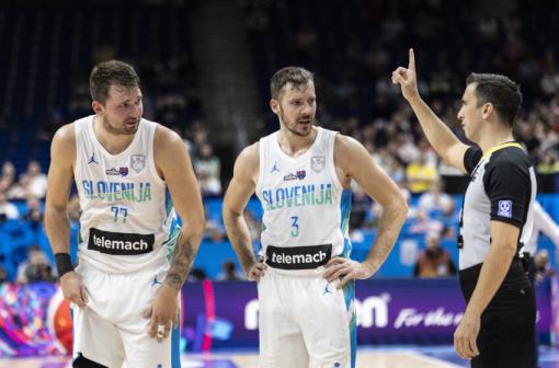 BERLIN, GERMANY - SEPTEMBER 14: Goran Dragic and Luka Do<em></em>ncic of Slovenia react during the FIBA EuroBasket 2022 quarterfinal match between Slovenia v Poland at EuroBasket Arena Berlin on September 14, 2022 in Berlin, Germany. (Photo by Maja Hitij/Getty Images)