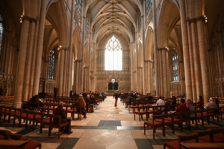 The clergy arrive at a church in York, UK