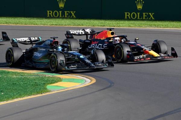 Mercedes' British driver George Russell leads Red Bull Racing's Dutch driver Max Verstappen during the 2023 Formula One Australian Grand Prix at the Albert Park Circuit in Melbourne on April 2. - Pic: AFP