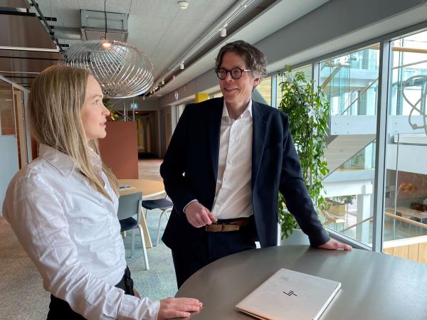 Torstein Gimnes Are, CISO, and Henriette Borgund, an ethical hacker at Hydro, pose for photos, in Oslo