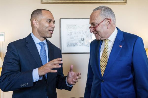 House Minority Leader Rep. Hakeem Jeffries, D-N.Y., left, meets with Senate Majority Leader Chuck Schumer of N.Y., on Capitol Hill in Washington on Dec. 21, 2022,