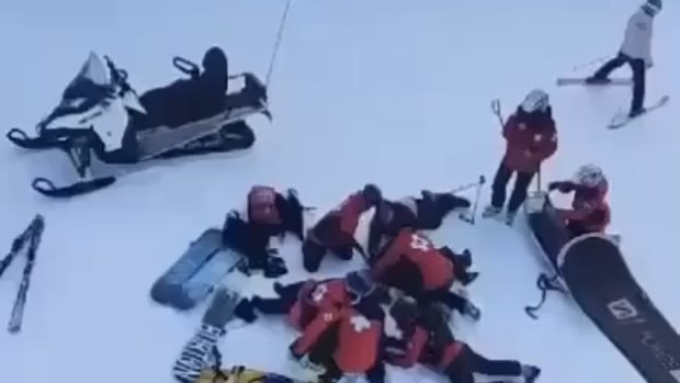 Snowboarders injured after a fall from a Thredbo chairlift.