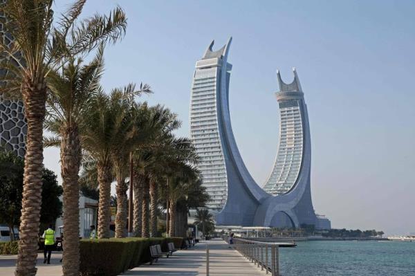 In this file photo taken on October 1, 2022 a general view shows the Katara Towers in the Qatari coastal city of Lusail ahead of the Qatar 2022 FIFA World Cup. - Mo<em></em>nths after hundreds of thousands of football fans packed into its hotels and stadiums, Qatar is seeking to remedy a bout of the post-World Cup blues by hosting more internatio<em></em>nal events. Along with the departed football crowds, thousands of foreign workers left the Gulf state after Lio<em></em>nel Messi lifted the coveted trophy on December 18. Many of those who stayed on are counting the cost. - Pic: AFP