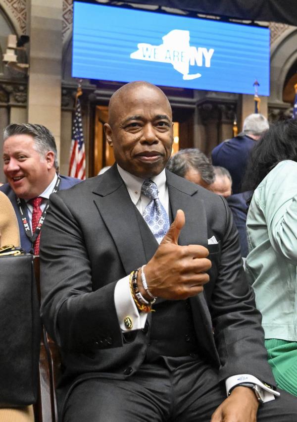 New York Mayor Eric Adams gestures as he arrives to hear Gov. Kathy Hochul deliver her State of the State address in the Assembly Chamber at the state Capitol, Tuesday, Jan. 10, 2023, in Albany, N.Y. 