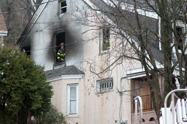 A house fire on Staten Island left two small children dead and four others injured, with two of them in serious condition, according to city officials. 