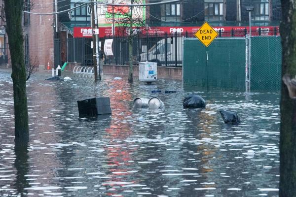 Coastal flooding is seen on the streets of Red Hook, Brooklyn, on Friday. 