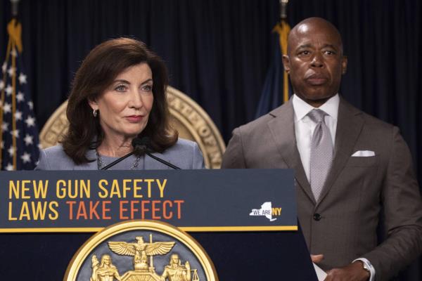 New York Gov.  Kathy Hochul, left, and New York City Mayor Eric Adams.