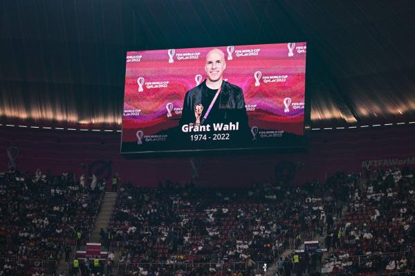 Journalist Grant Wahl appears on screen at World Cup match after his death last week.