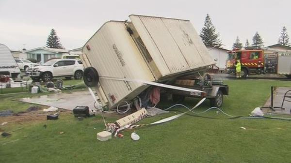 Family trapped in a caravan after a gust of wind tips it over at Moana Beach Tourist Park in Adelaide