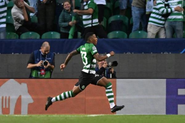 Brazilian forward Arthur Gomes celebrates after scoring Sporting Lisbon's second goal against Tottenham