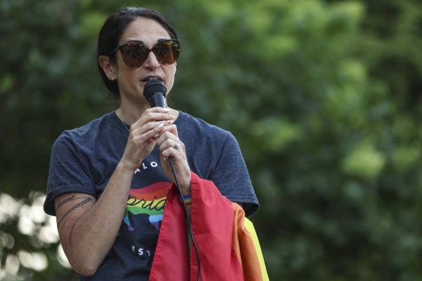 Carolyn Pinta speaks during a Pride flag-raising ceremony on June 1, 2023, in Buffalo Grove. 